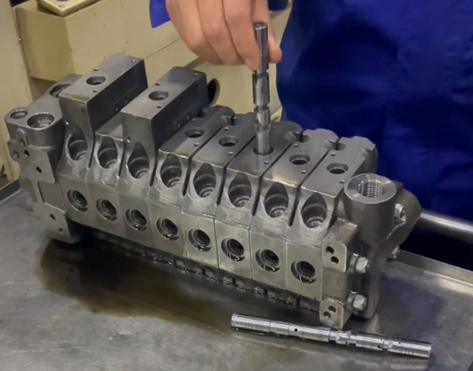 How We Fixed Ball Shedding and Wrong Grit Selection in Hydraulic Manifold Oil-Channel Deburring